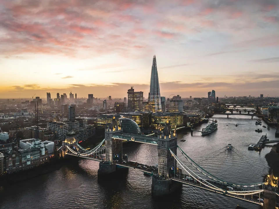 London skyline at dusk with Tower Bridge and the Shard over the Thames