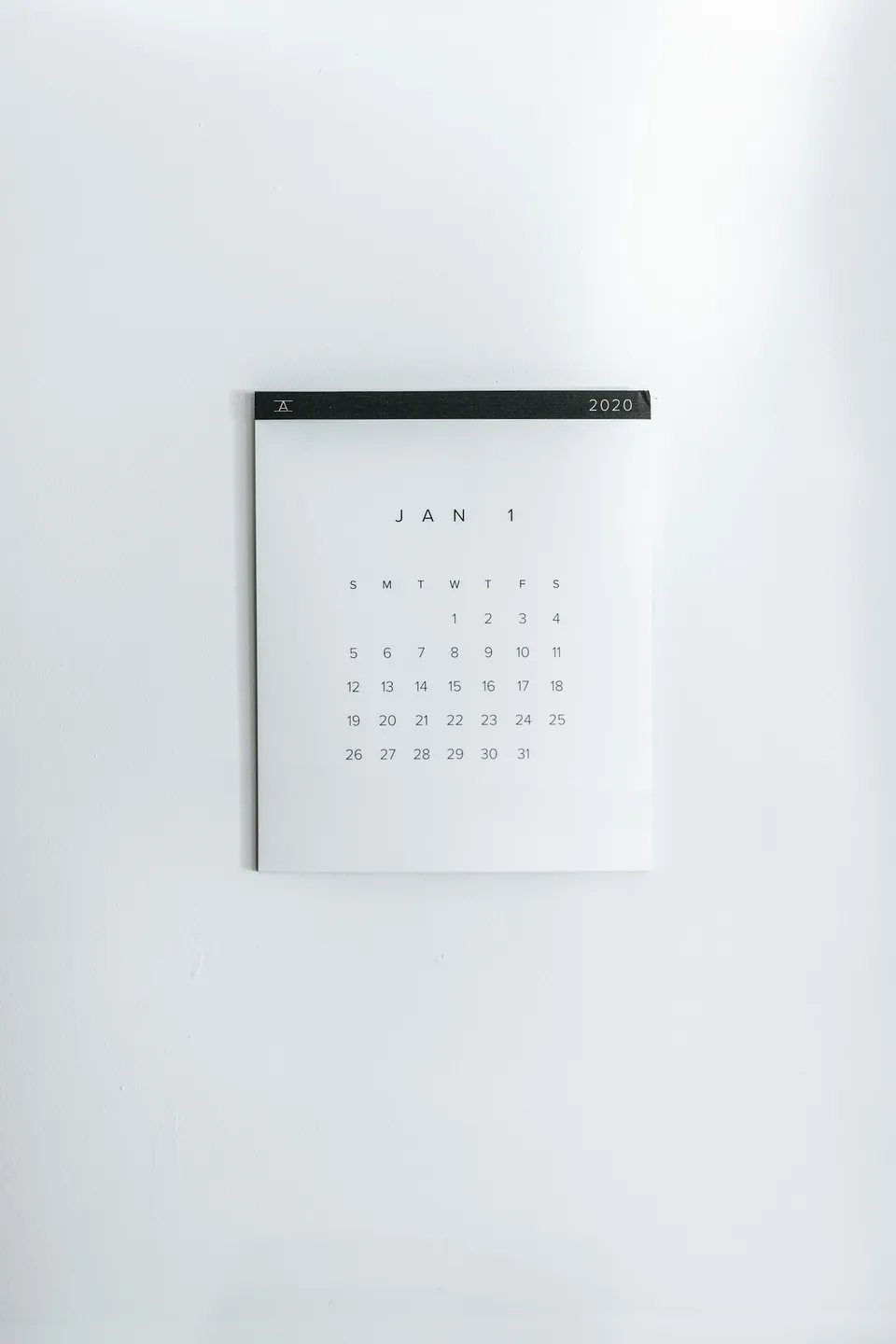 Minimal wall calendar on a white wall