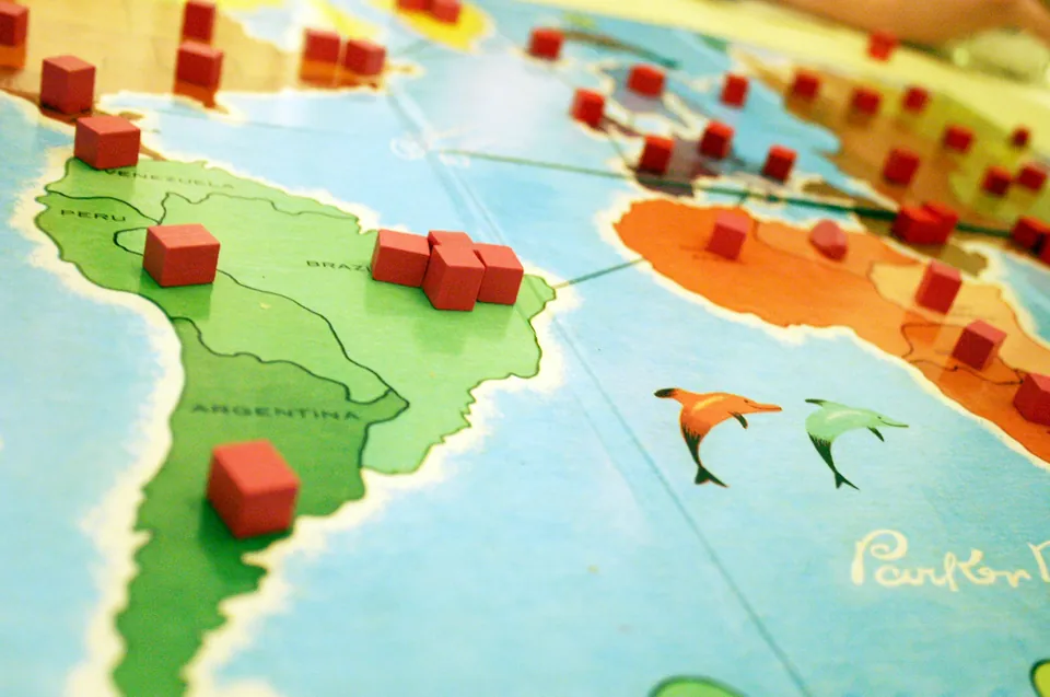 Map of South America with red markers placed on countries