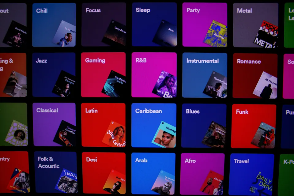 Grid of colorful music genre playlist tiles