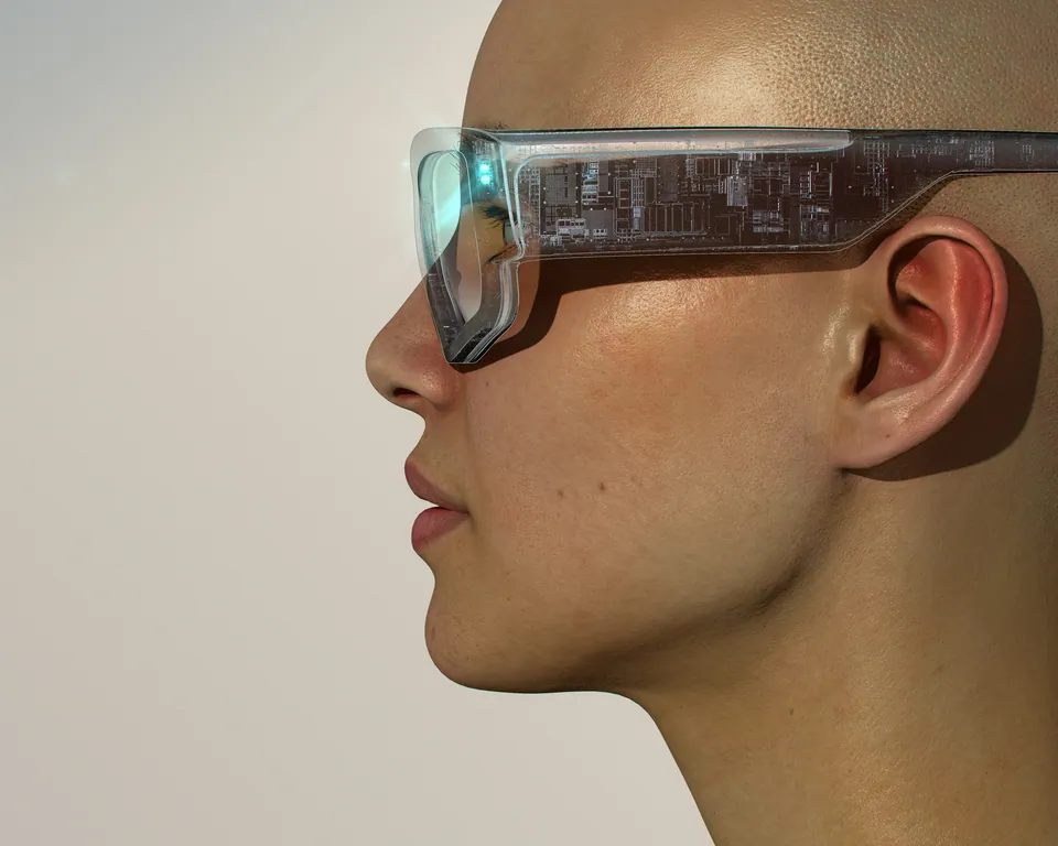 Profile of a person wearing smart glasses with a glowing display