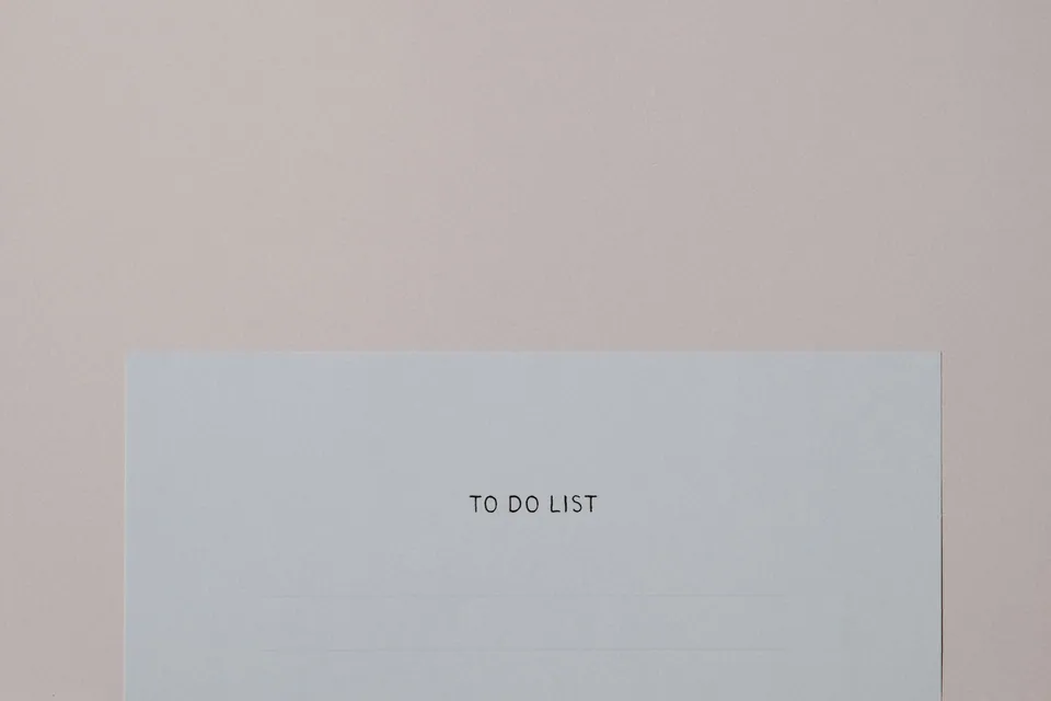 Card reading TO DO LIST on a pale background