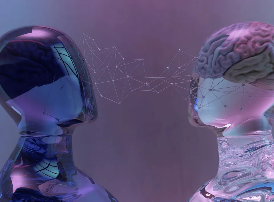 Two glass human heads facing each other linked by a digital network