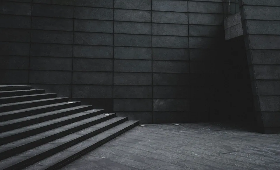 Dimly lit stairway inside a modern building