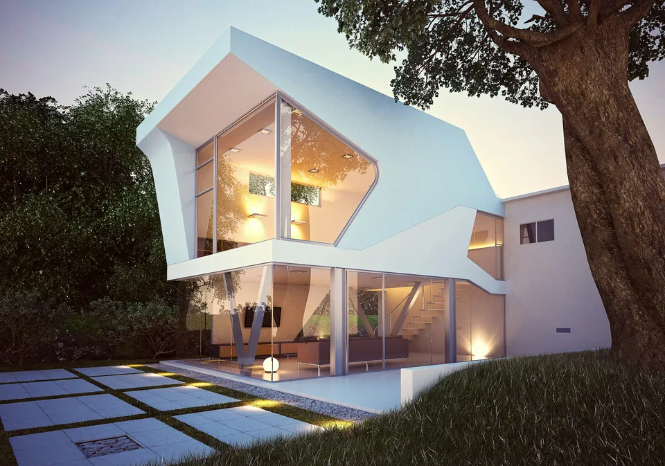 Modern white angular house lit up at dusk